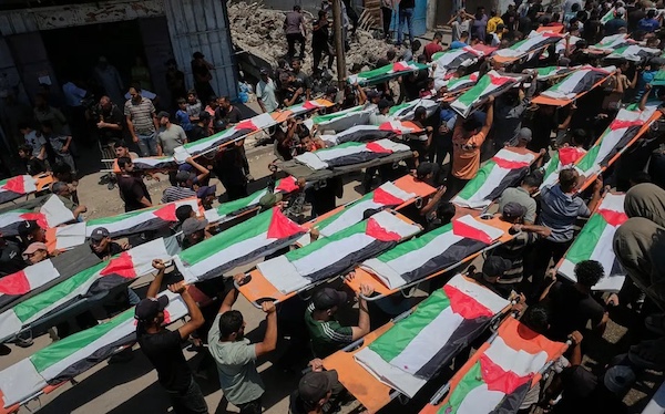 The funeral procession for members of the Hassayna and Abu Sharia families, who were killed in an Israeli strike in 2023 and whose remains were only recently recovered from the rubble, Gaza City, 4 August 2026 CREDIT: AP