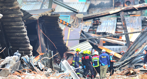A rescue team stands amid rubble in Nepal on September 2, 2026.