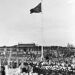 The flag of the People's Republic of China is raised over Tiananmen Square for the first time on October 1, 1949.