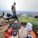 An M23 soldier stands guard overlooking Bunagana, a small town in North Kivu Province in the eastern Democratic Republic of the Congo. Photo by Al Jazeera/Flickr.