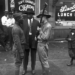 In the Bronzeville neighborhood of Chicago, a Black WWI veteran confronts a member of the white Illinois militia during the August 1919 “Red Summer” riots. During the six days of violence, 38 people died (23 Black and 15 white) and more than 500 were injured.